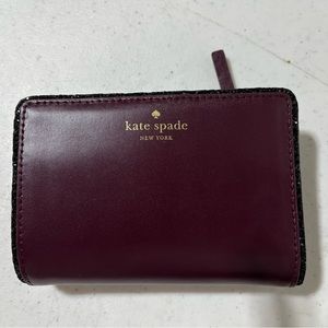 Small burgundy Kate spade with glitter wallet
